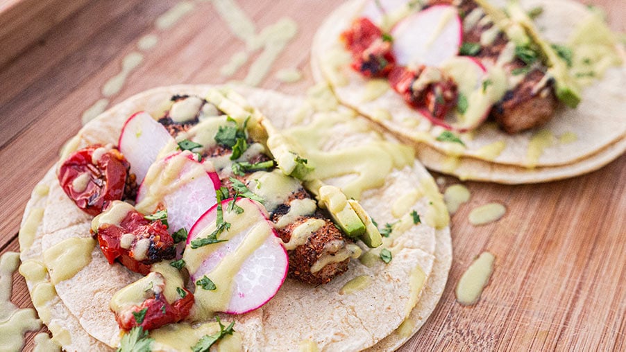 Grilled Mahi Tacos on a cutting board